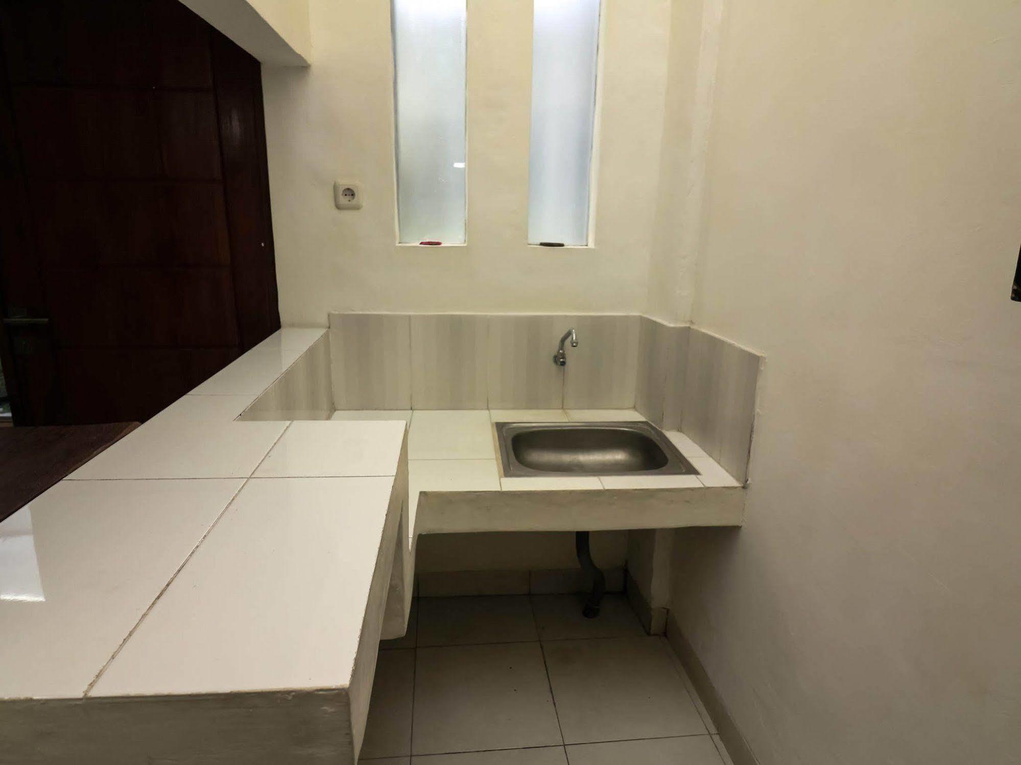 Super Oyo 91495 Hotel Indah Residence 丹帕沙 外观 照片